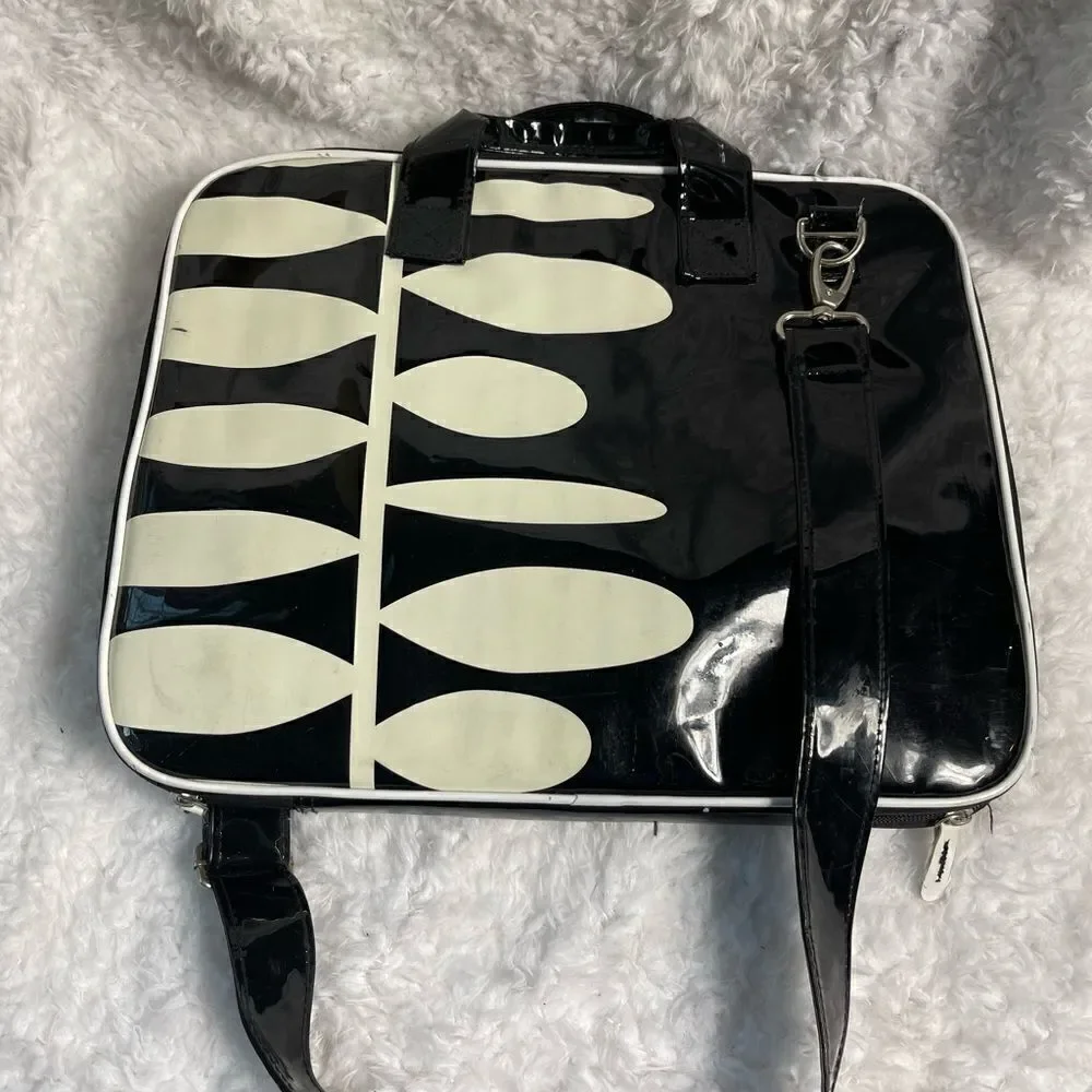 Black and white padded laptop bag with detachable padded shoulder strap